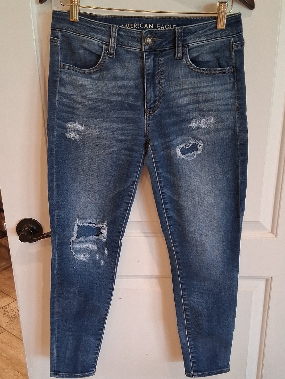 American Eagle Medium Blue Super Stretch  Distressed Jeggings Size 8S